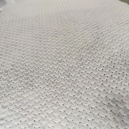 Perforowana i tłoczona włóknina na górny arkusz pieluchy dla niemowląt